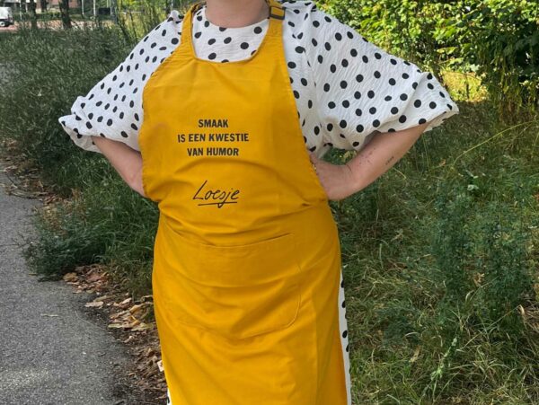 Loesje schort - smaak is een kwestie van humor