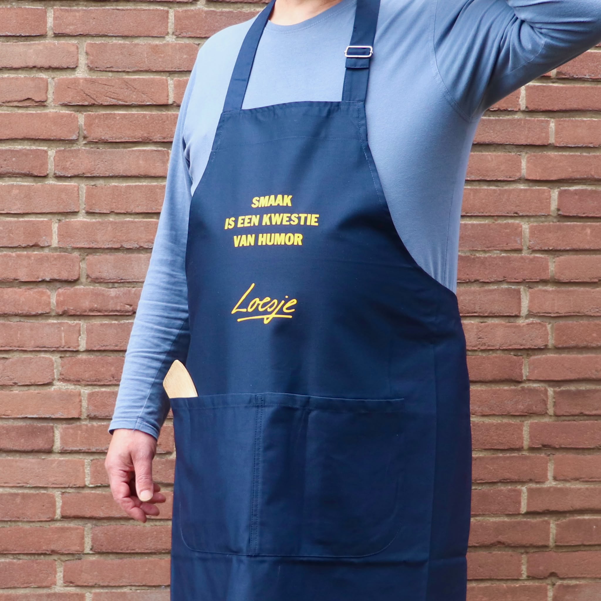 Loesje schort - smaak is een kwestie van humor-