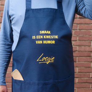 Loesje schort - smaak is een kwestie van humor-