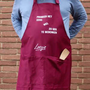 Loesje schort - probeer het eens wel zo gek te bedenken